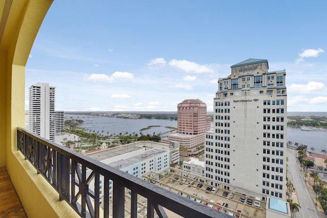 balcony featuring a water view