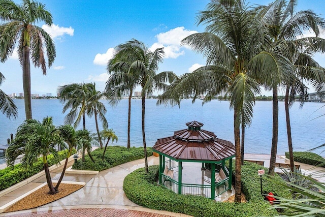 view of community featuring a gazebo and a water view