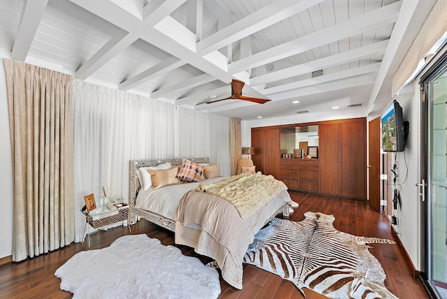 bedroom featuring dark hardwood / wood-style floors, beam ceiling, and ceiling fan