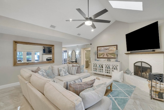 living room featuring vaulted ceiling and ceiling fan