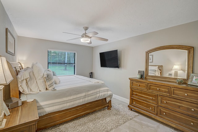 bedroom featuring ceiling fan