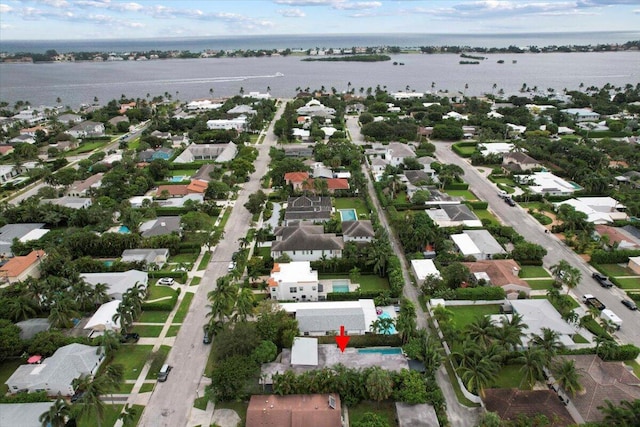 drone / aerial view with a water view