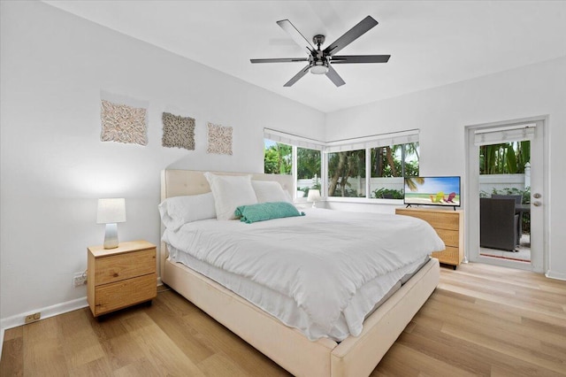 bedroom with ceiling fan and light hardwood / wood-style flooring