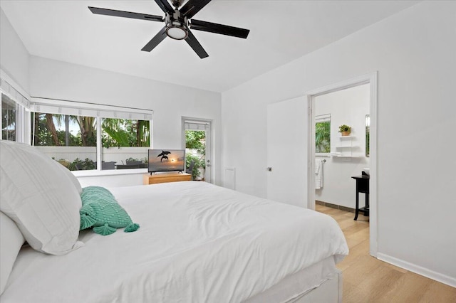 bedroom with ceiling fan and light wood-type flooring