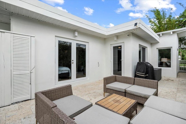 view of patio / terrace featuring outdoor lounge area, french doors, and grilling area