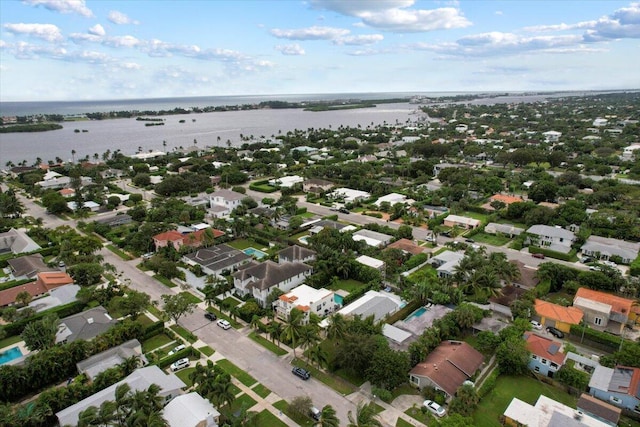 drone / aerial view with a water view