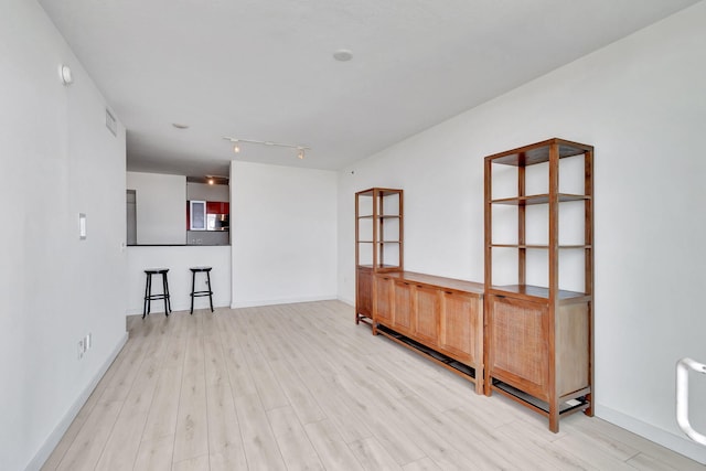 unfurnished room featuring light hardwood / wood-style flooring