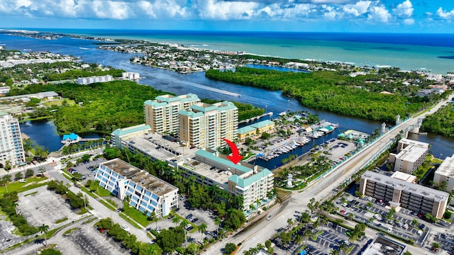 drone / aerial view with a water view