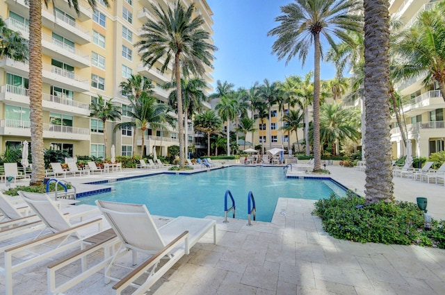 view of swimming pool featuring a patio