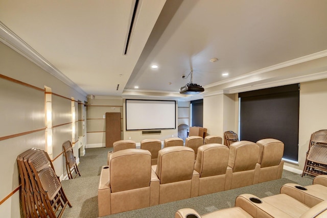 carpeted home theater room featuring ornamental molding