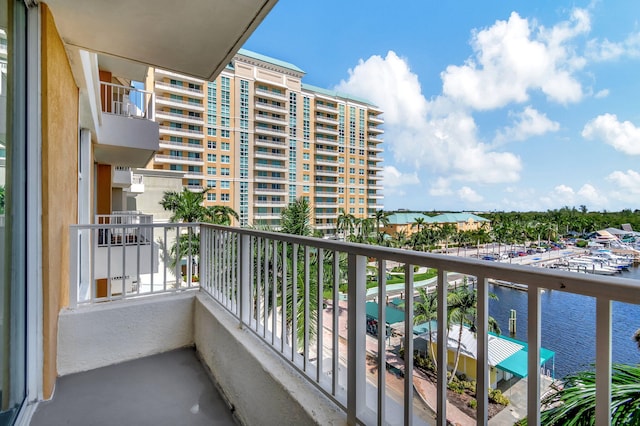 balcony featuring a water view