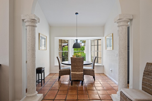 tiled dining area with decorative columns