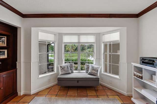 living area featuring a textured ceiling, crown molding, and light tile patterned flooring