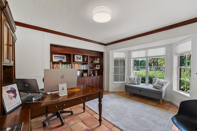 tiled office with a textured ceiling and ornamental molding