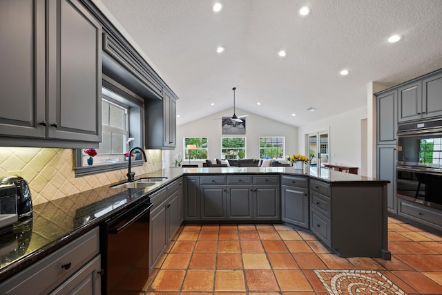 kitchen featuring dishwasher, double oven, kitchen peninsula, lofted ceiling, and gray cabinets