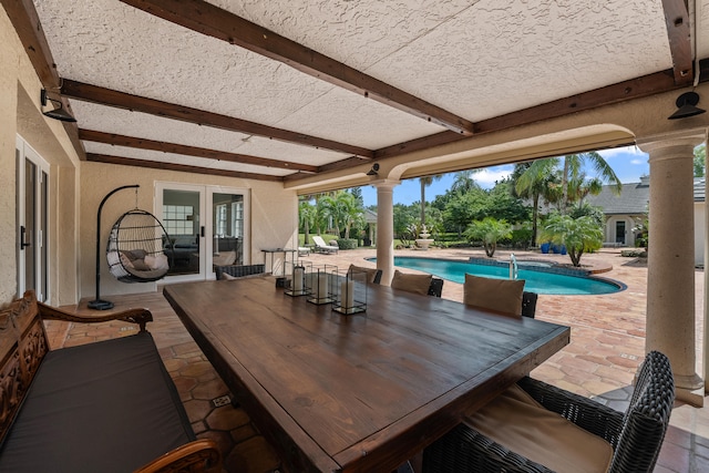 view of patio featuring french doors