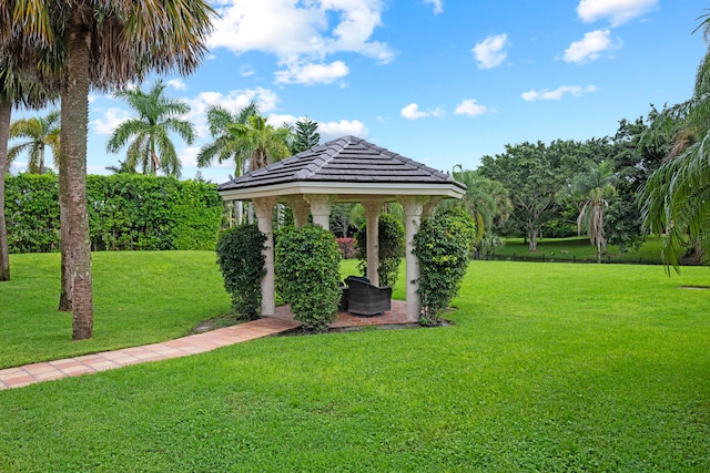 view of community featuring a gazebo and a lawn