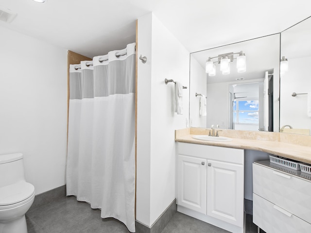 bathroom with walk in shower, vanity, and toilet