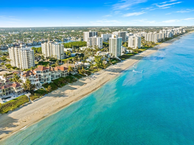 drone / aerial view with a view of the beach and a water view