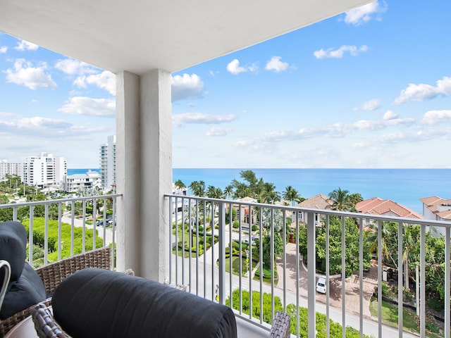 balcony featuring a water view