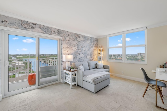 interior space featuring crown molding and a water view