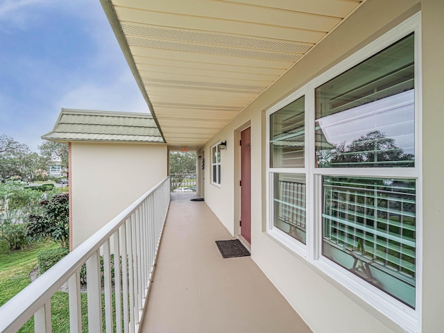 balcony featuring a sunroom