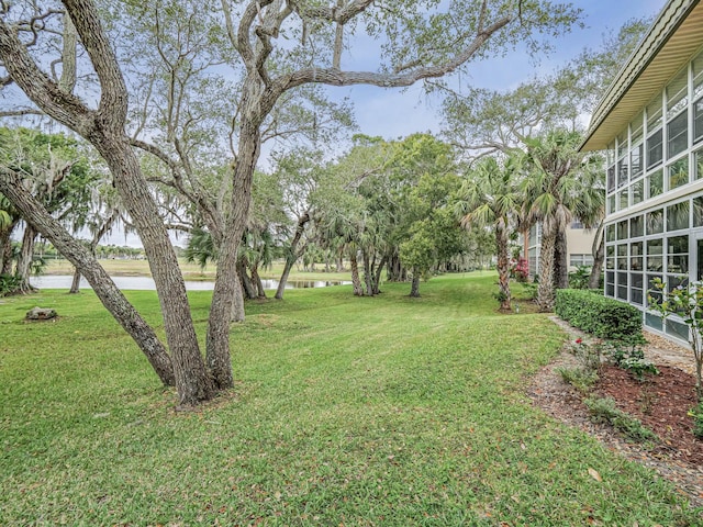 view of yard with a water view