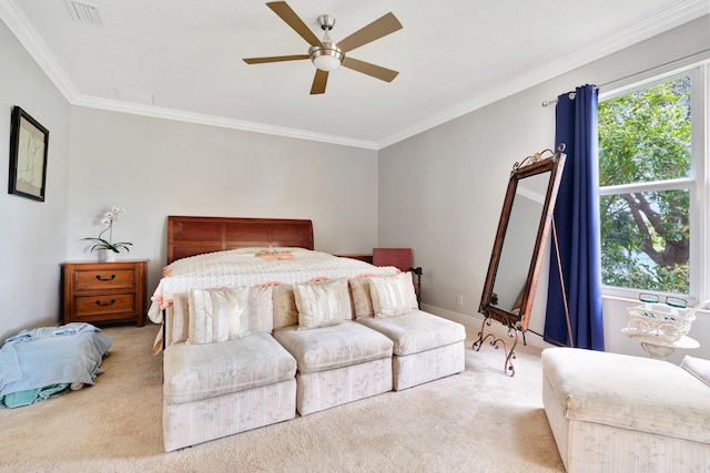 carpeted bedroom featuring multiple windows, crown molding, and ceiling fan