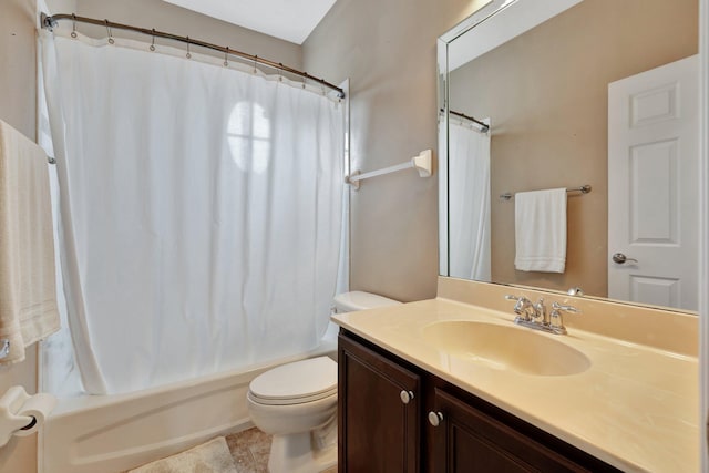 full bathroom featuring toilet, shower / bath combo with shower curtain, vanity, and tile patterned flooring