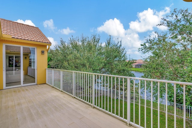 balcony featuring a water view