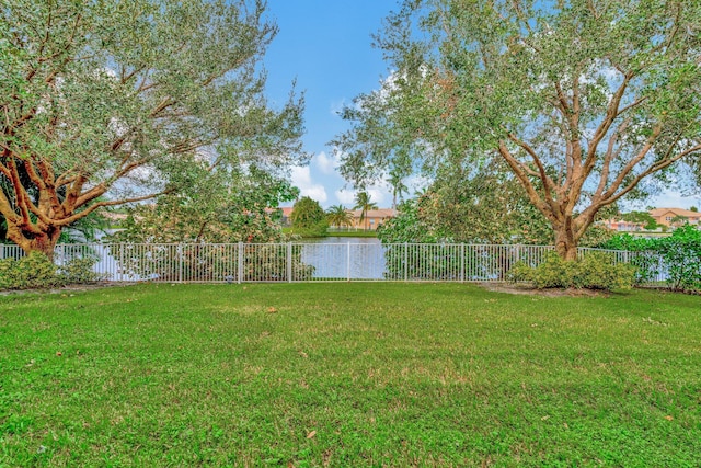 view of yard with a water view