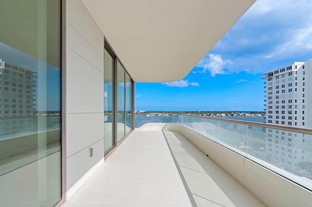 balcony featuring a water view