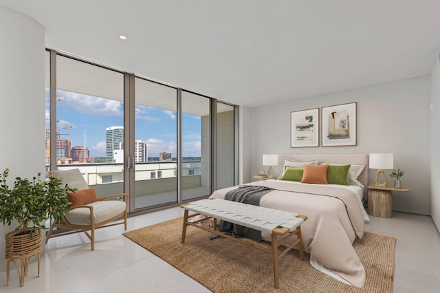 bedroom featuring access to exterior and a wall of windows