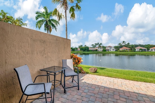 view of patio / terrace with a water view