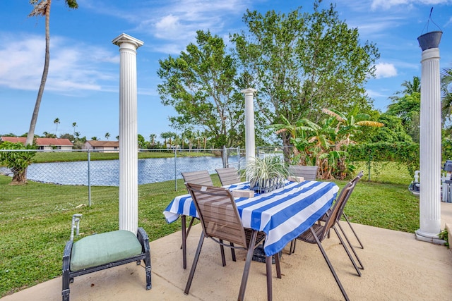 view of patio / terrace with a water view