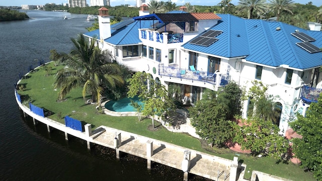 aerial view featuring a water view