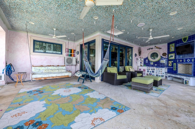 view of patio featuring ceiling fan