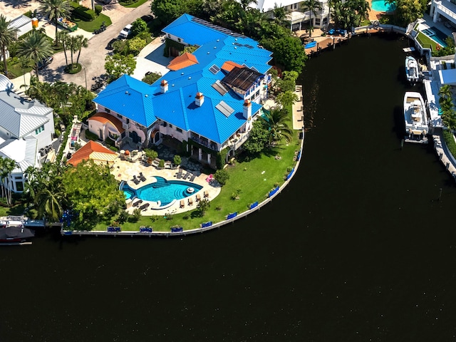 birds eye view of property featuring a water view