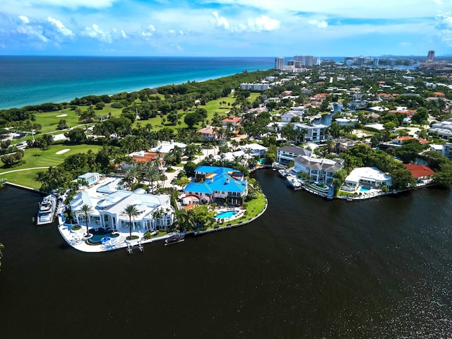 birds eye view of property featuring a water view