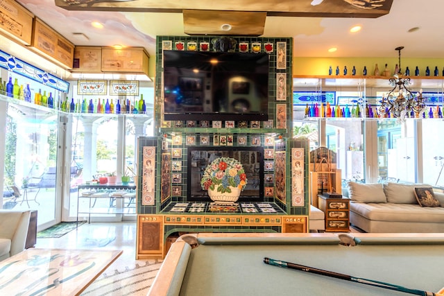 recreation room with a wealth of natural light and billiards