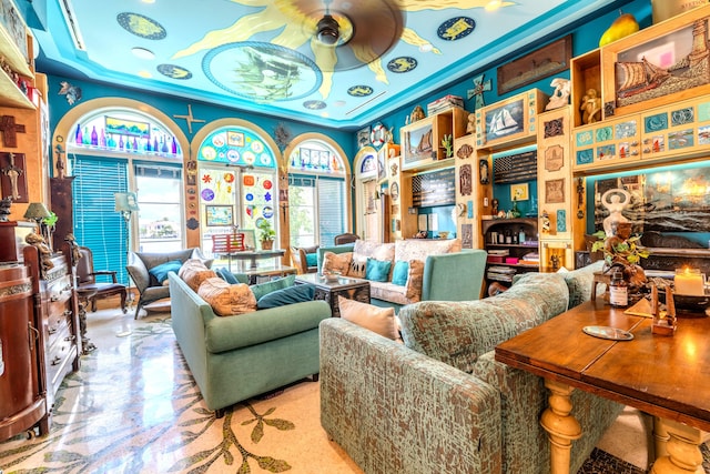 living area featuring ceiling fan