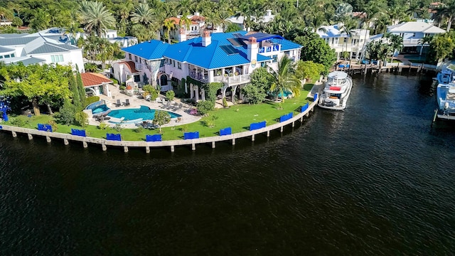 drone / aerial view featuring a water view