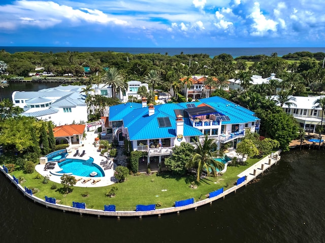 aerial view featuring a water view