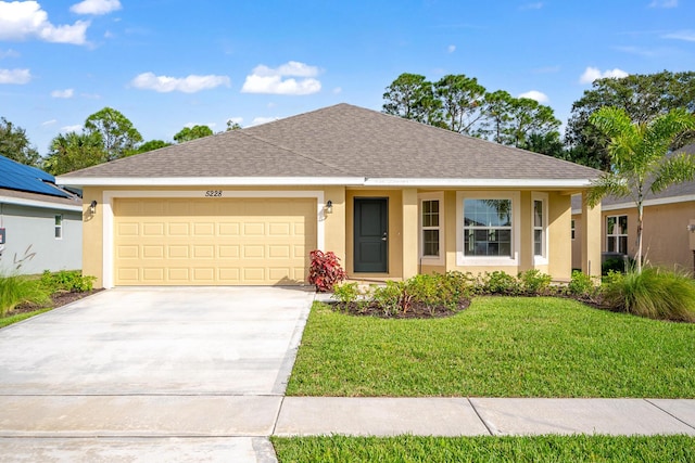 5215 San Benedetto Pl, Fort Pierce, FL 34951 - ranch-style home featuring stucco siding, an attached garage, driveway, and a front yard