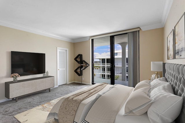 bedroom featuring access to exterior, carpet floors, a closet, and crown molding