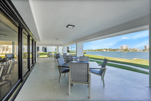 view of patio / terrace with a water view