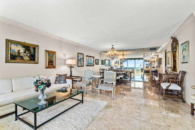 living room featuring a notable chandelier, ornamental molding, and a textured ceiling