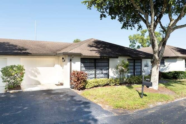 ranch-style house with a garage