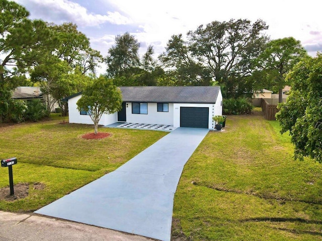 ranch-style home with stucco siding, a front yard, fence, a garage, and driveway