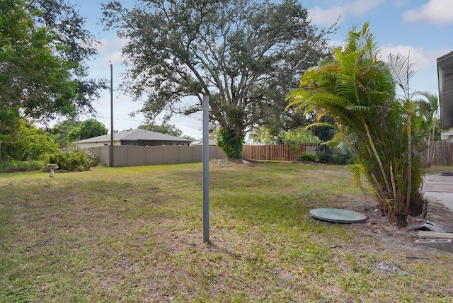 view of yard with fence